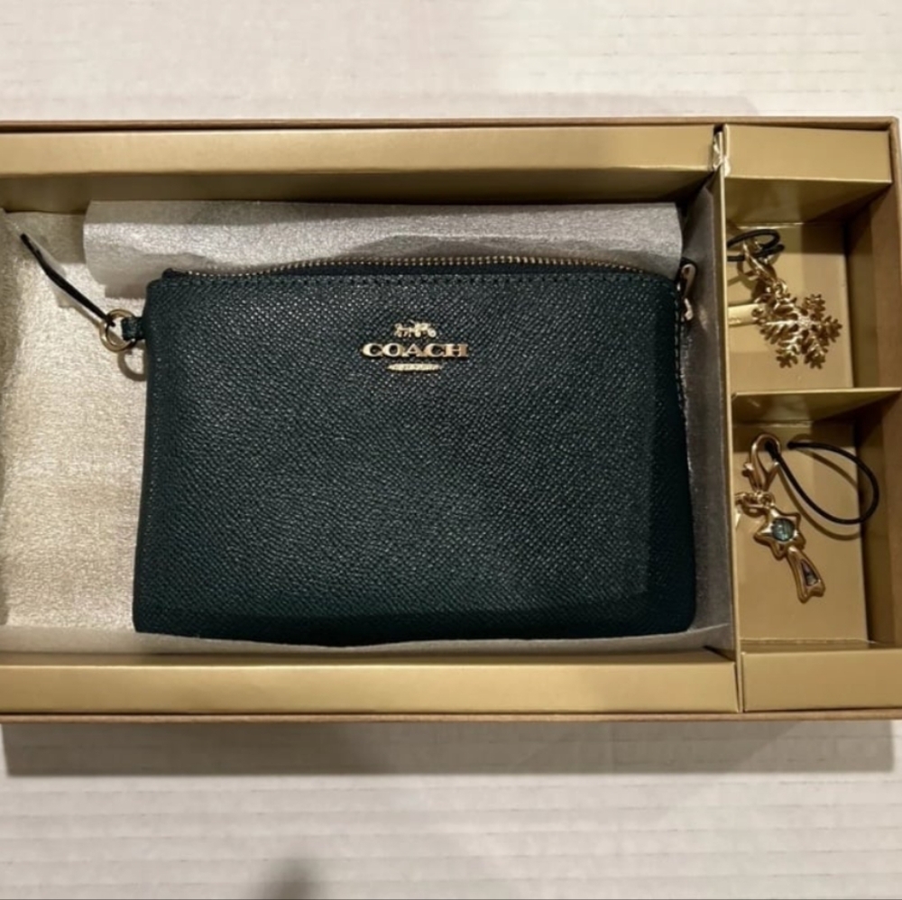 Coach wristlet/Wallet with 2 Authentic Coach Charms